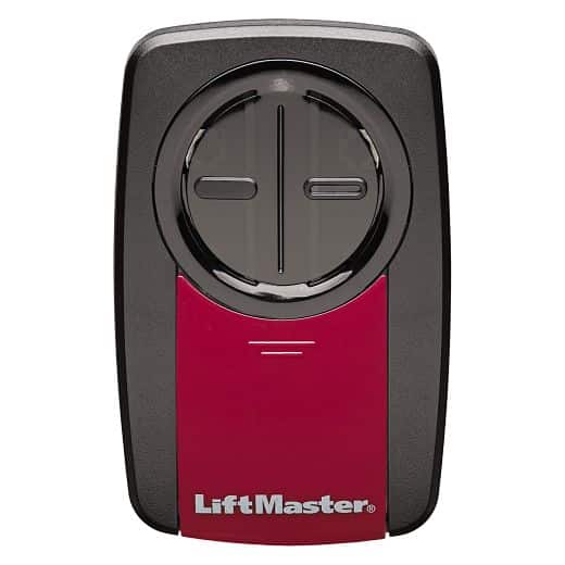 A LiftMaster garage door opener remote with a circular black button, horizontal and vertical grooves, and a red lower section displaying the LiftMaster logo.